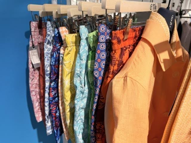Blue and orange Distretto shirts displayed during the Spring Summer 2027 menswear buying season