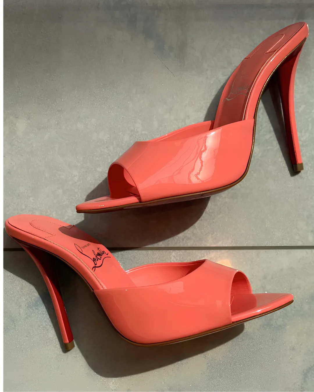Christian Louboutin Miss Z Mule in vibrant grapefruit pink-orange with a 100mm heel