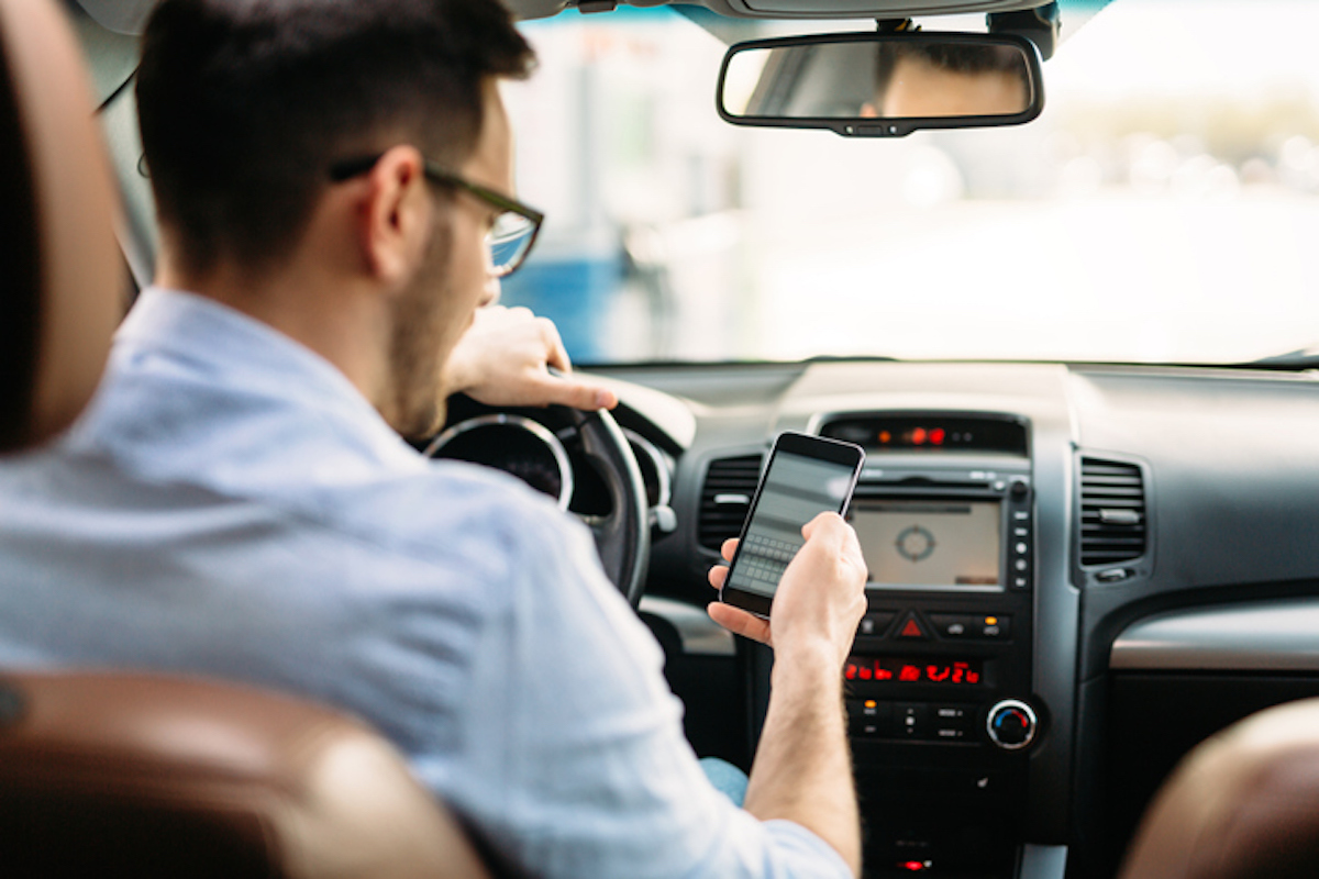 Yikes! Americans use their phones in the car for an hour on average