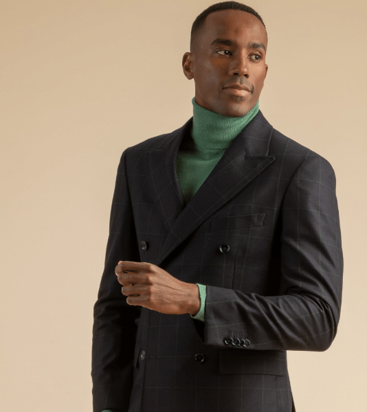 Close-up of Scabal Fall Winter 2025 fabrics including herringbone, plaids, and checks at Garmany Red Bank New Jersey